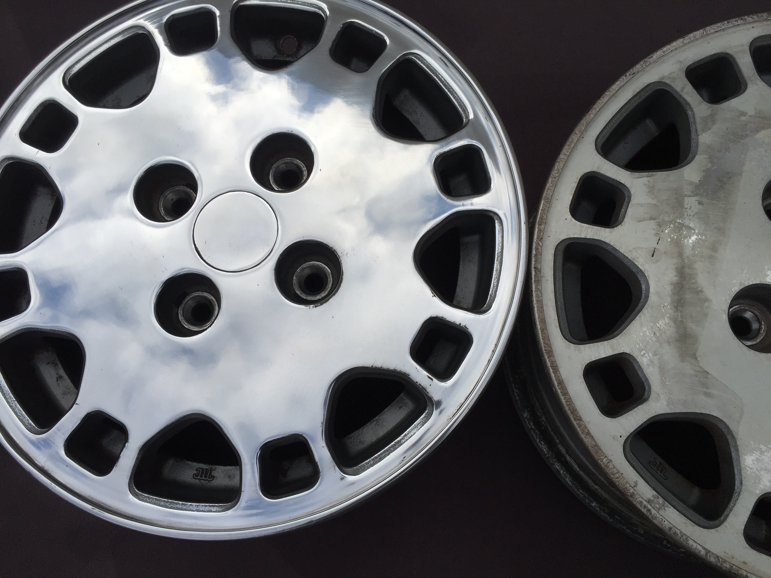 Alloy wheel before and after restoration — left mirror polished, right original dull